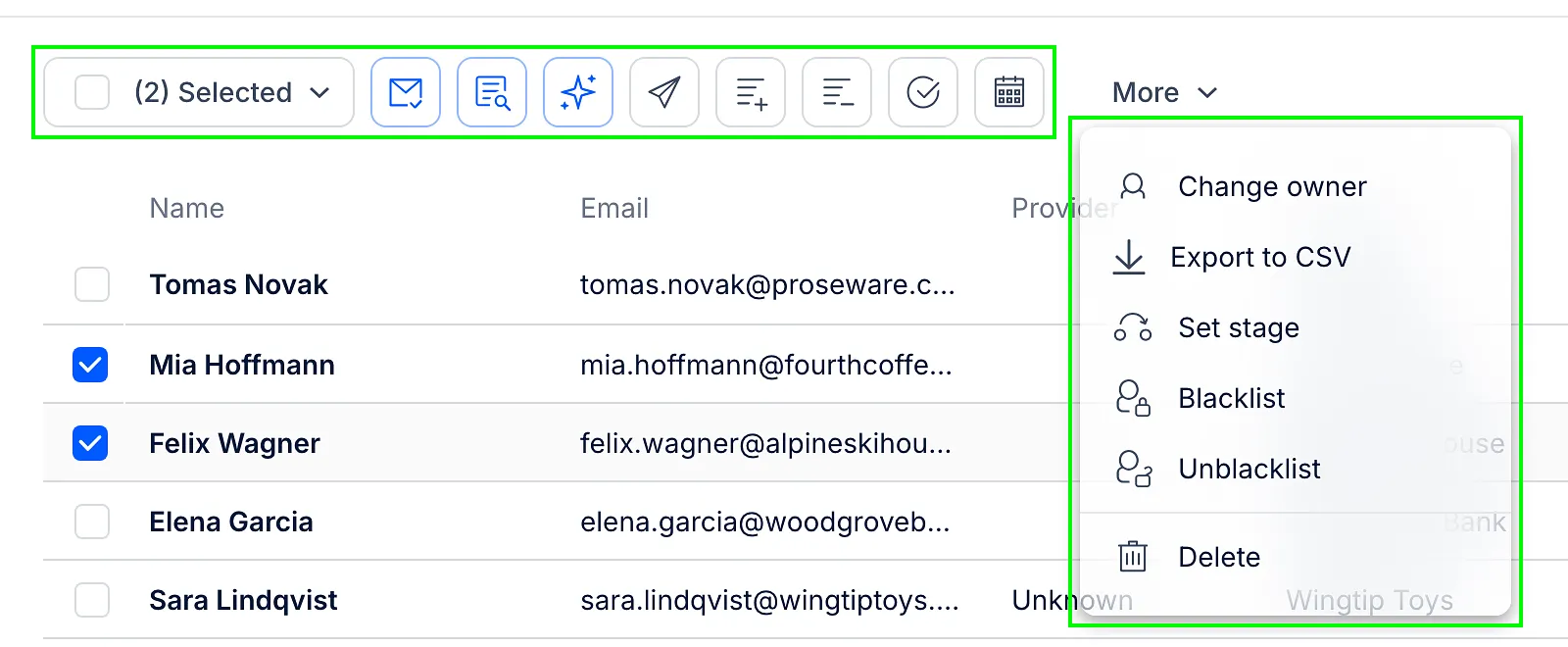 Two contacts selected, with the quick actions bar and the More menu open showing Change owner, Export to CSV, Set stage, Blacklist, Unblacklist and Delete